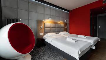 Фото номера Двухместный номер с 2 отдельными кроватями Отель Artis Loft Hotel г. Радзеёвице 2
